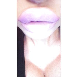 Freakishly large and fake lips - blonde