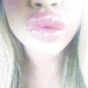 Freakishly large and fake lips - blonde