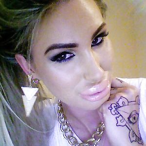 Freakishly large and fake lips - blonde