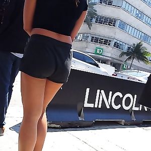 Candid voyeur hottie in gym shorts big tits shopping - booty