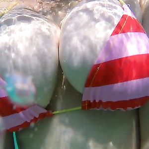 Busty Bikini MILF: Britney Swallows topless. Big tits public swimming pics. - big boobs