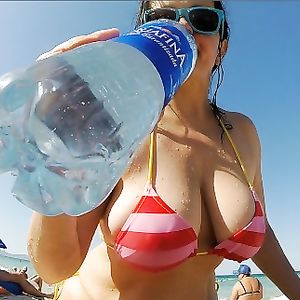 Busty Bikini MILF: Britney Swallows topless. Big tits public swimming pics. - big boobs