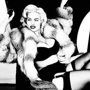 Women in furs - asses